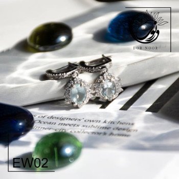 گوشواره نقره با سنگ آکوامارین تراش بیضی کد Ew02